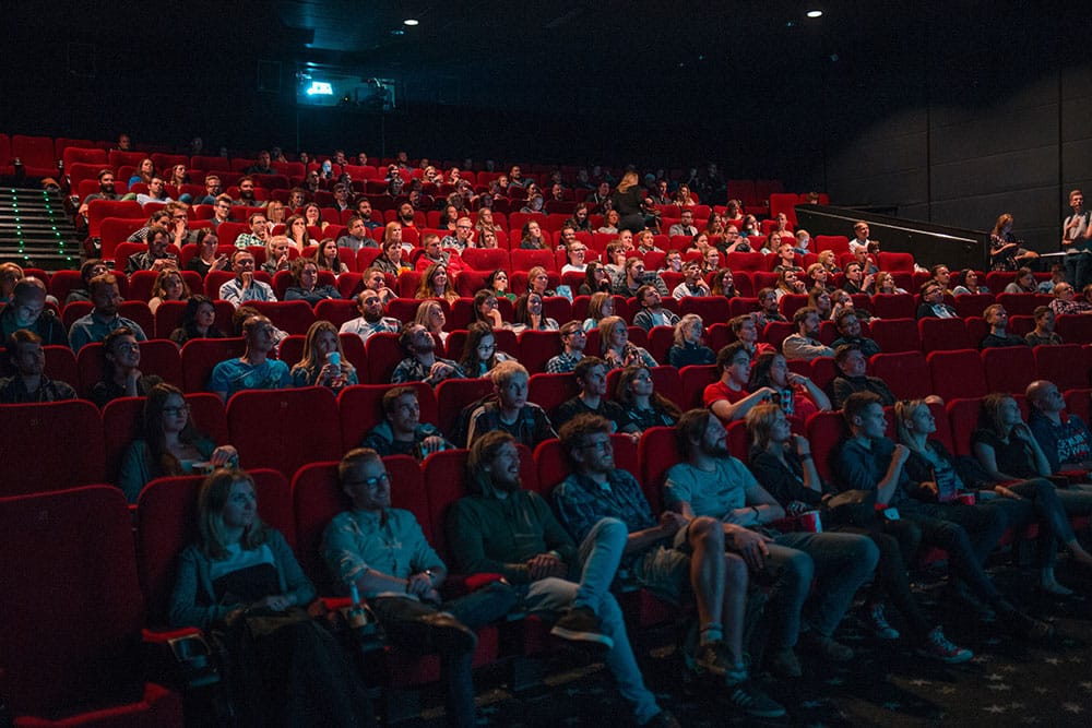 Cinema audience watching a funny film