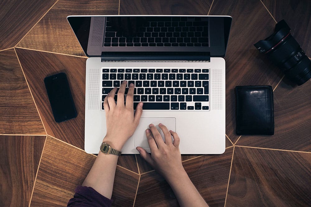 Screenwriter sitting in front of laptop