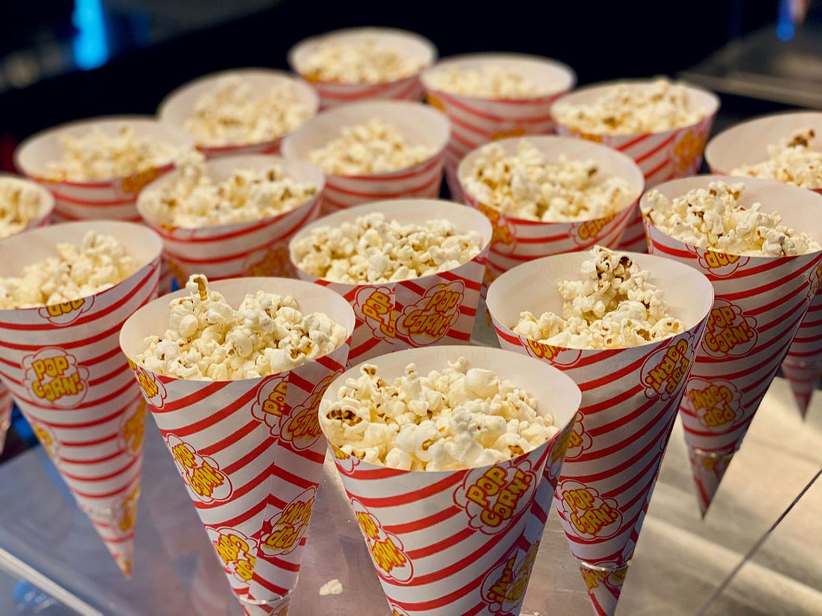 Bags of popcorn at a cinema snackbar