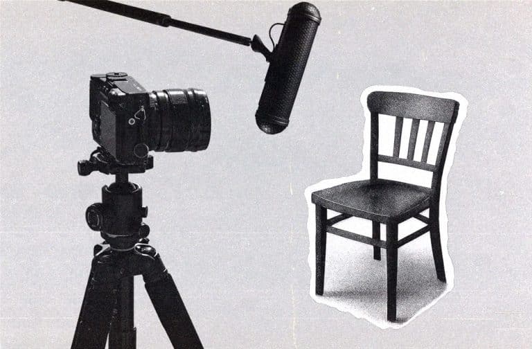 Casting setup with a camera, boom mic, and empty audition chair.