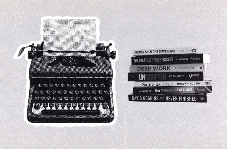vintage typewriter next to stack of books