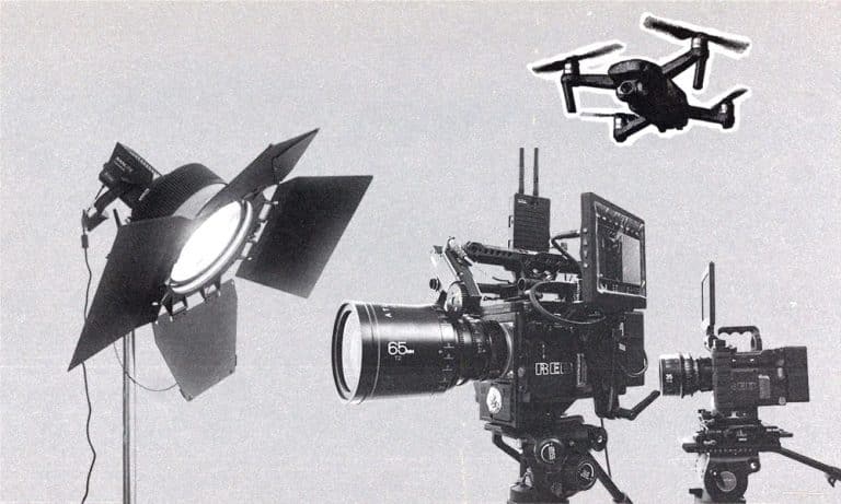 Film production equipment including cinema camera, lighting, and illustration of a drone.
